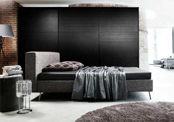 braune ziegelwand schwarze wände design idee schlafzimmer