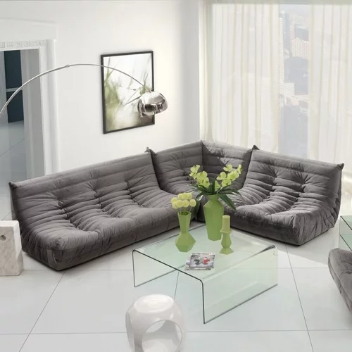 grau wohnzimmer sitzplätze glastisch tufted zuo modern