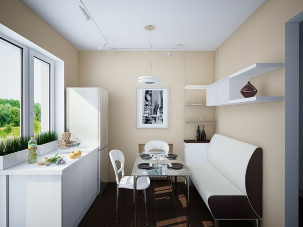 küchenbereich mit weiß brauner sitzecke 