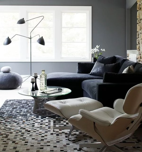 das zeitlose Eames Lounge Chair bequem sofa stehlampe interessant