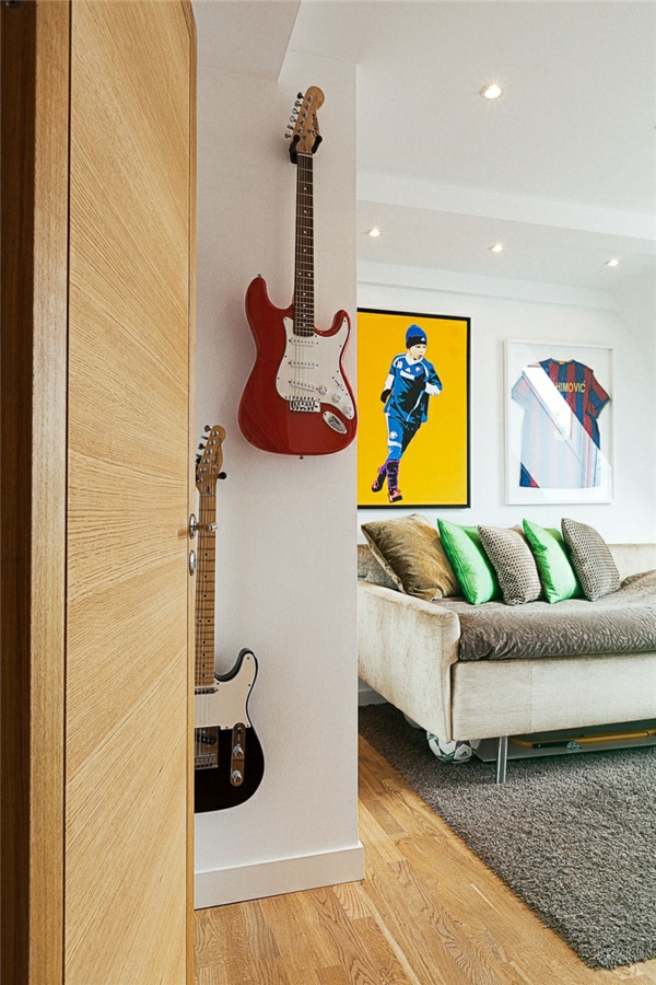 loftwohnung in schweden elegant gitarren hängend sofas teppich