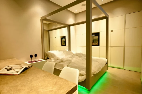 futuristische schlafzimmer designs grünes neonlicht unter dem bett