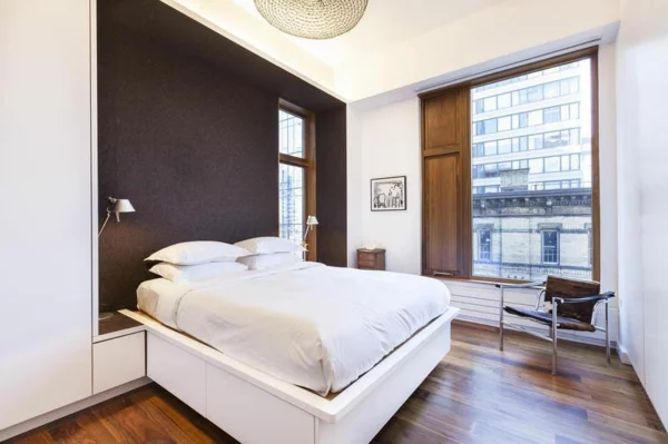 moderne Wohnung in SoHo schlafzimmer weiß matratze bequem