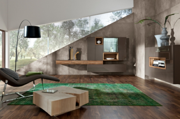 moderne wohnzimmer einrichtung grasgrüner teppich beistelltisch aus baumstamm
