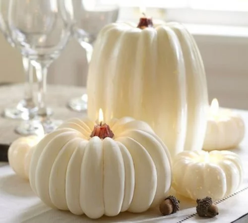 beliebte halloween dekorationen weiße kürbisse mit kerzen