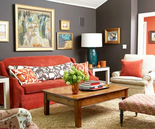 elegante Wohnzimmer Möbel schwarz wände gemälde rot sofas