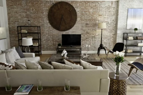 industrielle Akzente im Interior Design wanduhr sofas wohnzimmer