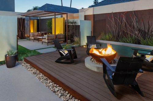 moderne Gestaltung im Garten essbereich feuerstelle veranda materialien