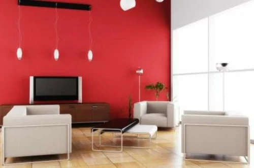 Kühne Wandgestaltung kontrastwand rot wohnzimmer sessel couchtisch