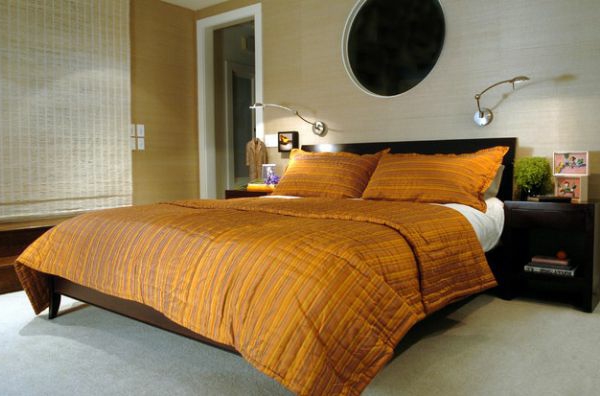 orange bettwäsche schlafzimmer rund wandspiegel
