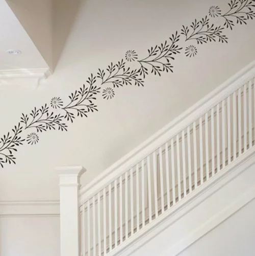Wanddekoration mit Wandtattoo blumen schwarz weiß treppe