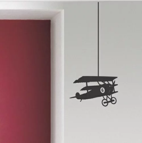 Wanddekoration mit Wandtattoo flugzeug hängend rot