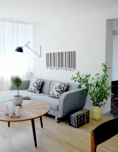 Wanddeko mit Wandtattoo wohnzimmer sofa grau