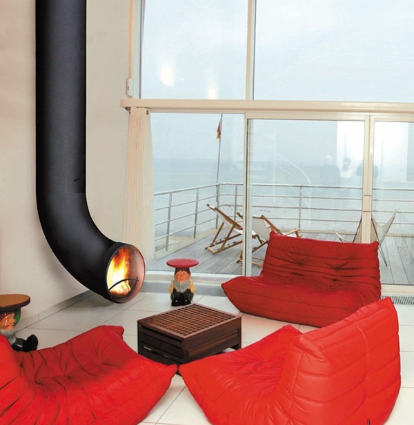 kaminofen im modernen haus rot sofas sessel hängenden industriell