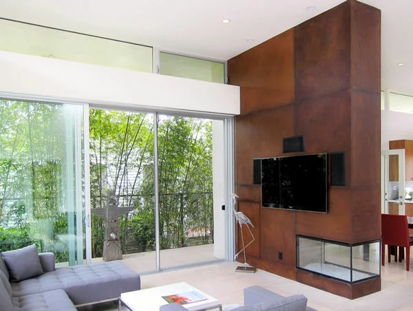 Metall-Akzente als Dekoration wand fenster glas wohnzimmer trennwand