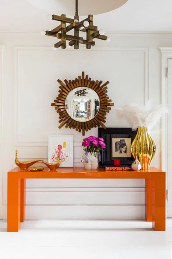 flur designideen orange tisch dekoration rundspiegel 