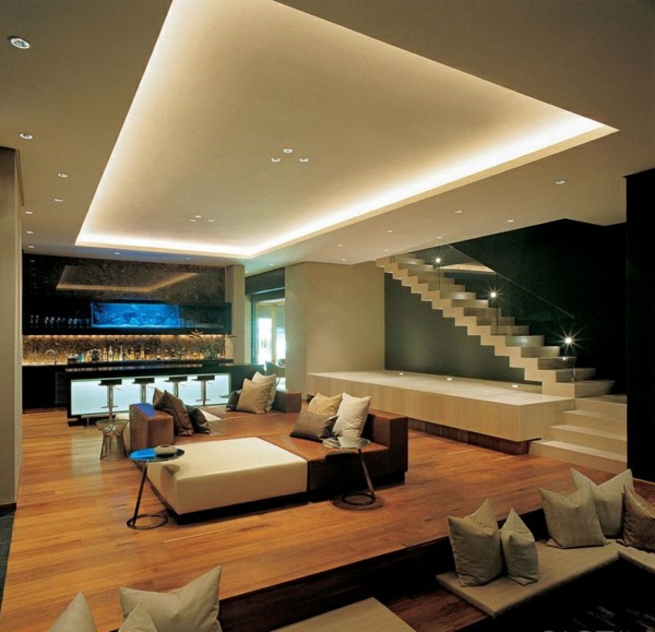 moderne treppen wohnzimmer glas geländer sofa dekokissen bar