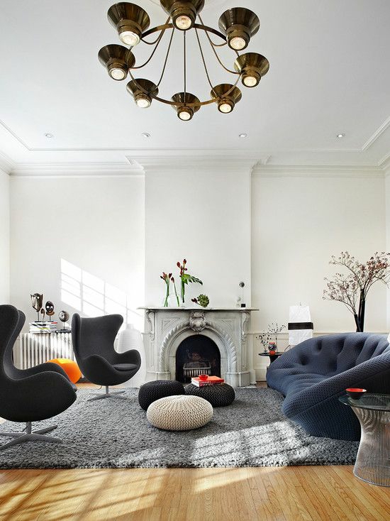 modernes wohnzimmer gestalten designer möbel eisessel kamin sitzkissen