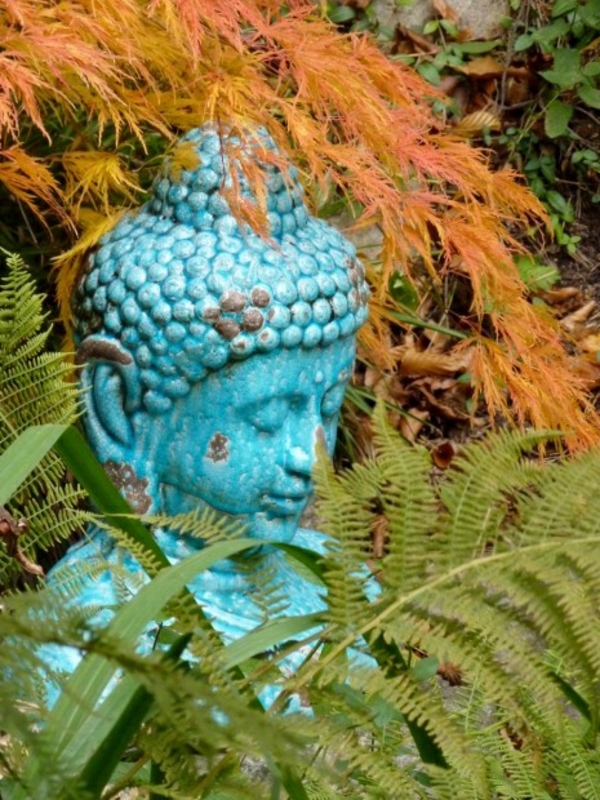 steinfiguren buddha kopf Buddha Figuren im Garten