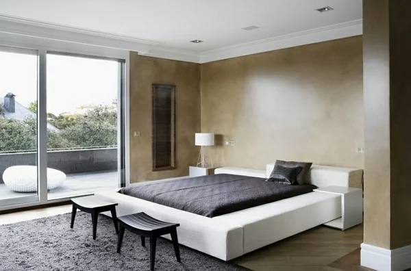 Schlafzimmer minimalistisch einrichten hocker teppich weich