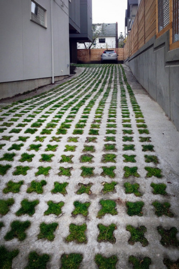 einfahrt pflastern bodenbelag beton gras