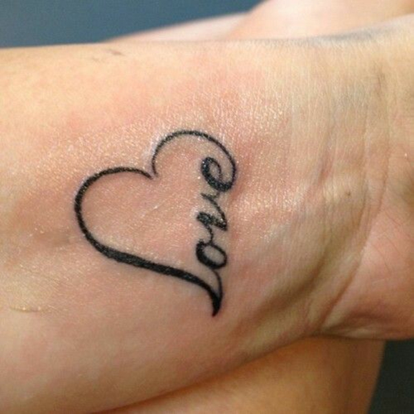 Frau unterarm herz tattoo Herz Tattoo