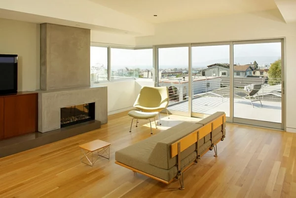 minimalistisch wohnzimmer bodenbelag holz feurstelle eingebaut sofa