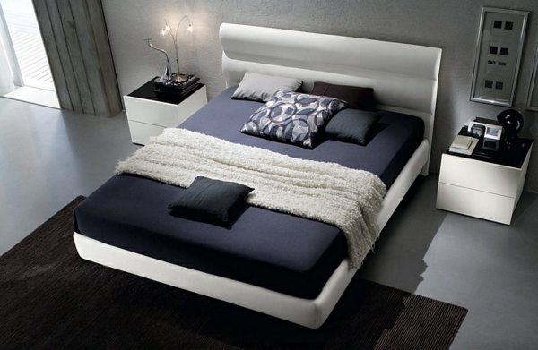 moderne-schlafzimmer-farben-schwarz-weiß-bett-teppich-nachttische