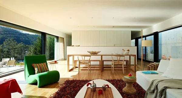 moderne wohnzimmer gestaltung grüner sessel