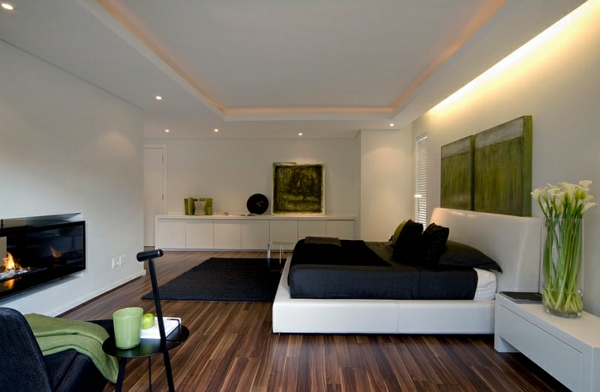 schlafzimmer farben ideen weiße wände schwarze akzente teppich bett 