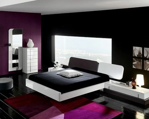 schlafzimmerwand gestalten wandgestaltung rosa und schwarz bett 