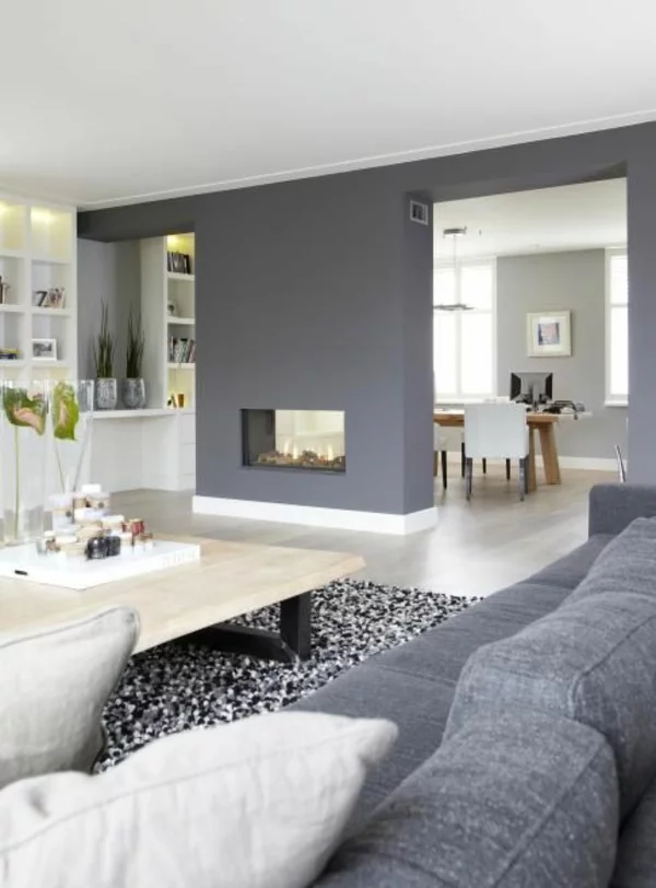 wandgestaltung grau wohnzimmer design sessel teppich kamin