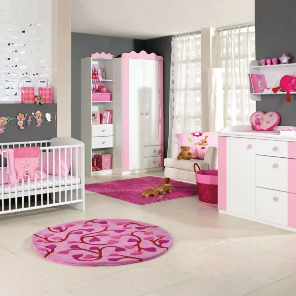 Babyzimmer einrichten deko ideen rund teppich rosa