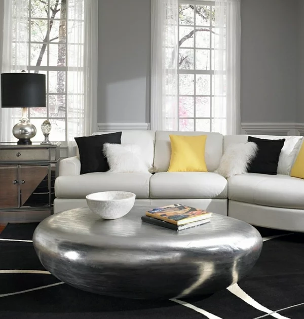 Farbgestaltung grau wand gelb kissen Wohnzimmer 