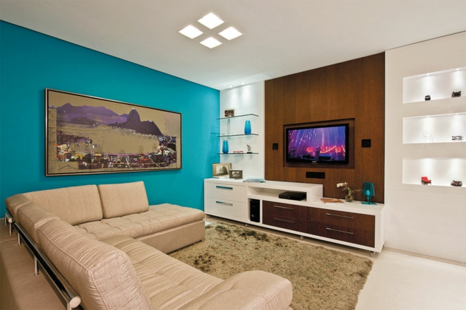 moderne wohnwand wohnzimmer gestalten einrichtungsideen wandfarbe türkis