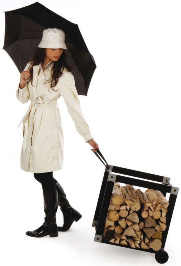 Designer ausstellung Kaminholz lagern regenschirm koffer