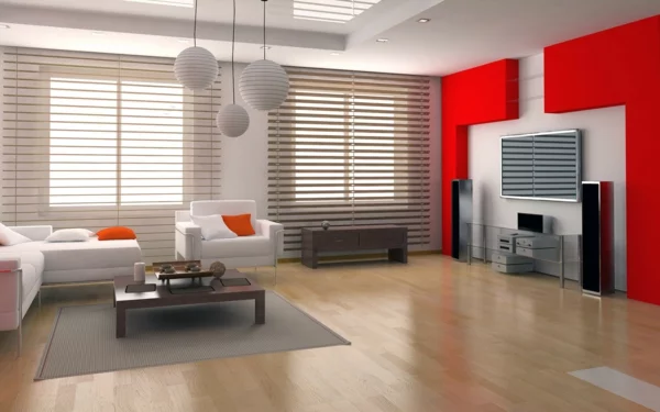 modernes Wohnzimmer weiße Sitzmöbel rote Wurfkissen TV Wand Holzboden Couchtisch aus Holz