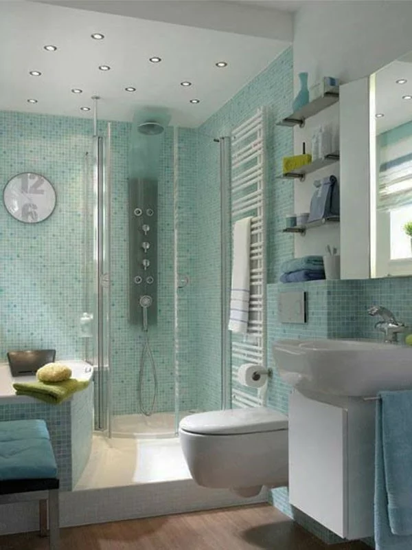 kleines bad fliesen blau mosaikfliesen duschkabine glas badmöbel