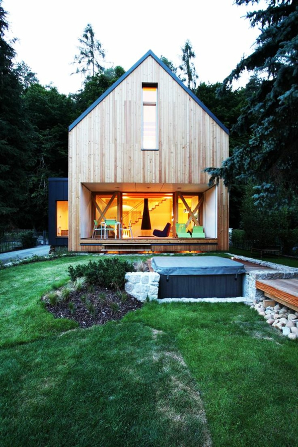moderne architektur landhaus holzhäuser mit vorbau veranda bauen terrassengestaltung