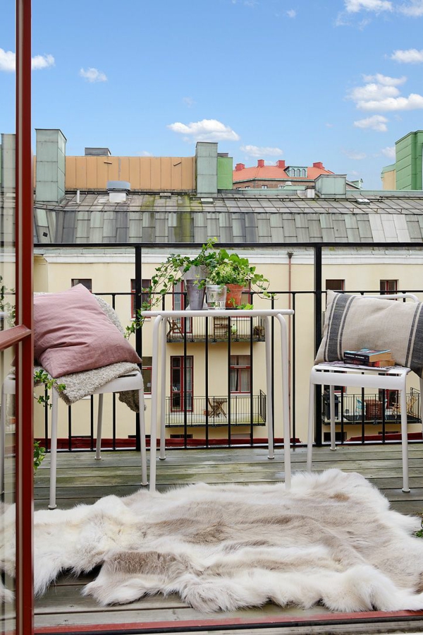 terrassengestaltung bilder balkonpflanzen fellteppich holzboden terrassen