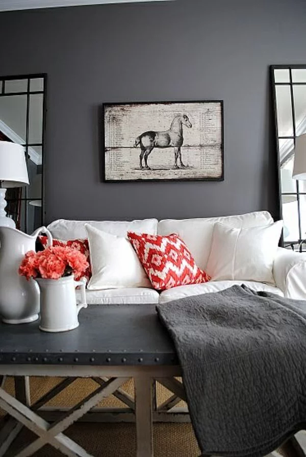 wohnzimmer sofa farben wandgestaltung grau kissen rot