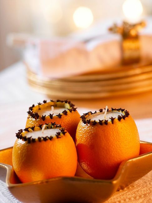 Weihnachtsschmuck basteln orangen in kerzenständer verwandeln