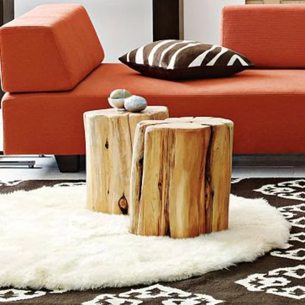 massivholz Couchtische orange sofa polsterung Baumstam hingucker