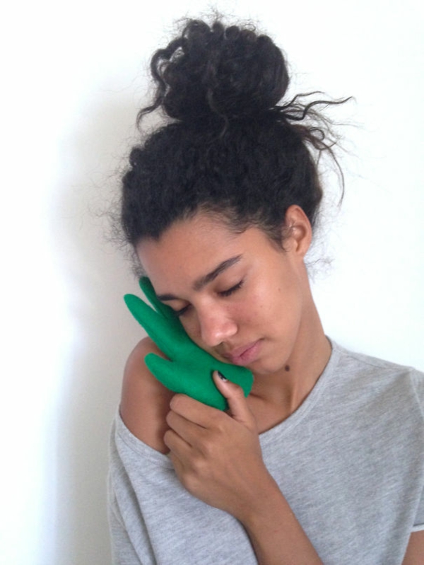 Kreative Dekokissen und Kopfkissen hand grün