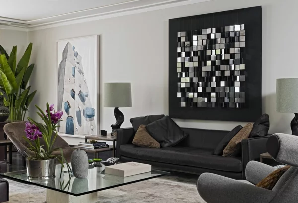schwarzes ledersofa elegantes wohnzimmer pflanzen