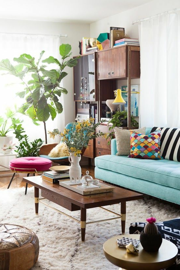 sofakissen farbige kissenbezüge hellgrünes sofa pflanze