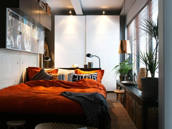 einrichtungstipps kleines schlafzimmer einrichten orange bettwäsche