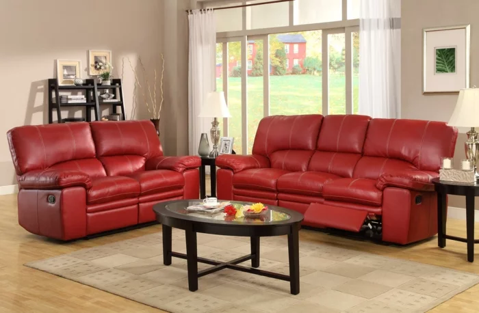 rotes sofa ovaler couchtisch wohnzimmer einrichten