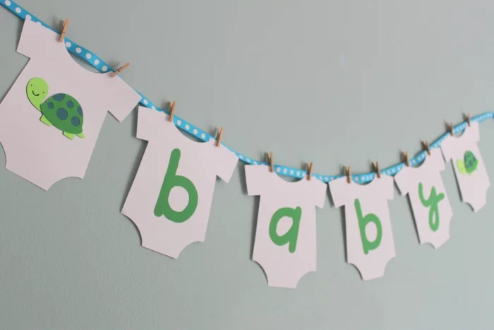 Baby party deko girlande selber machen wand dekorieren