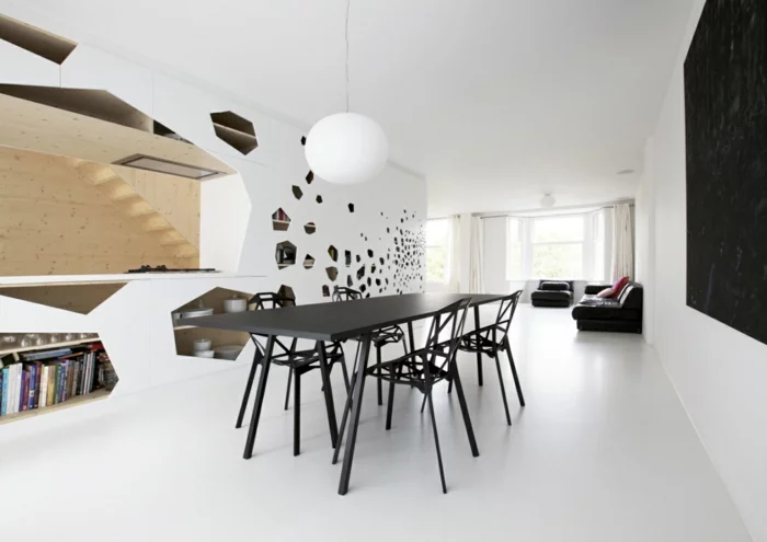 esszimmermöbel modern schwarzer tisch ausgefallene stühle tolle wanddeko
